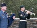 The bugler plays the last post, the piper's lament followed