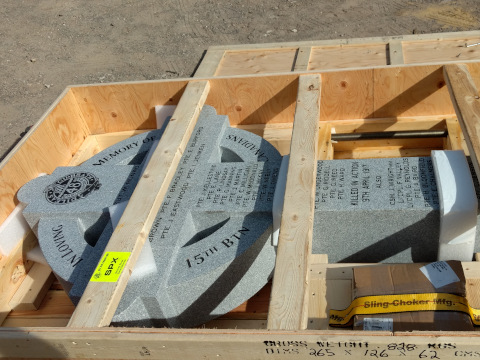 The stone cross arrives in France