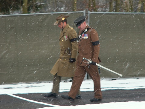 The officers arrive for the Close of Day ceremony