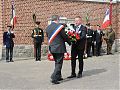 M Zechel poses his wreath
